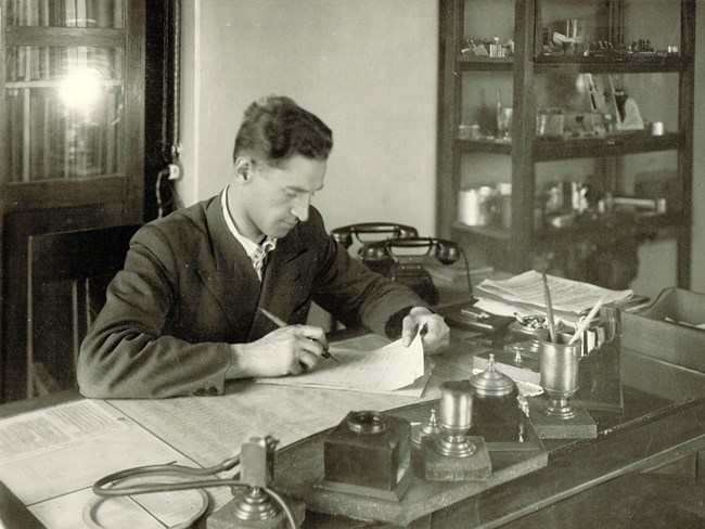 Chief metallurgist of the Stalin Molotov Plant No. 19 Leonid Dmitriev in his office
