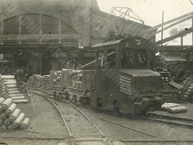 Electric locomotive transporting parts from the stamping shop to the machine shop on the site of the Lysva Metallurgical Plant